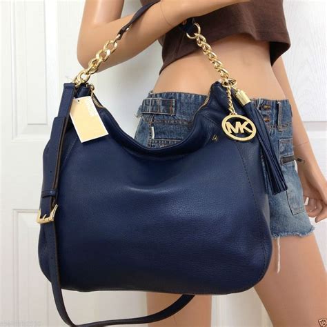 michael kors navy blue leather shoulder tote|Michael Kors blue crossbody bag.